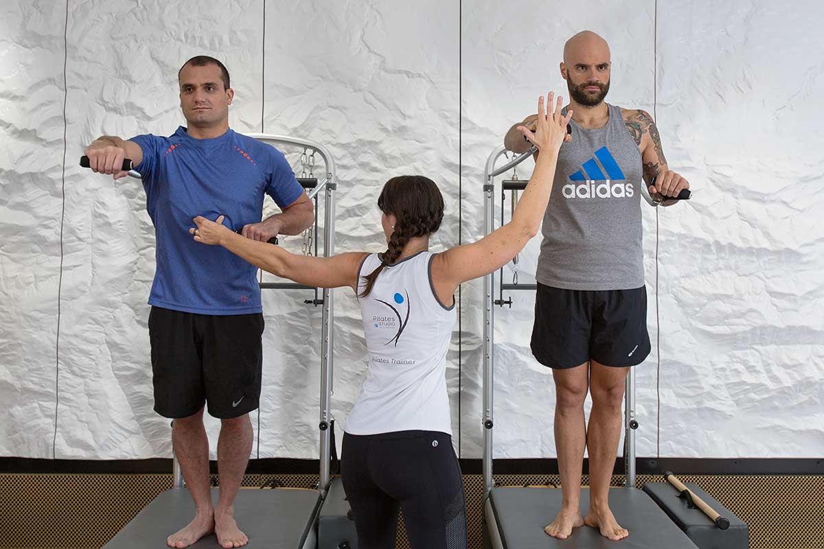 Men Training in Pilates Studio Allmend